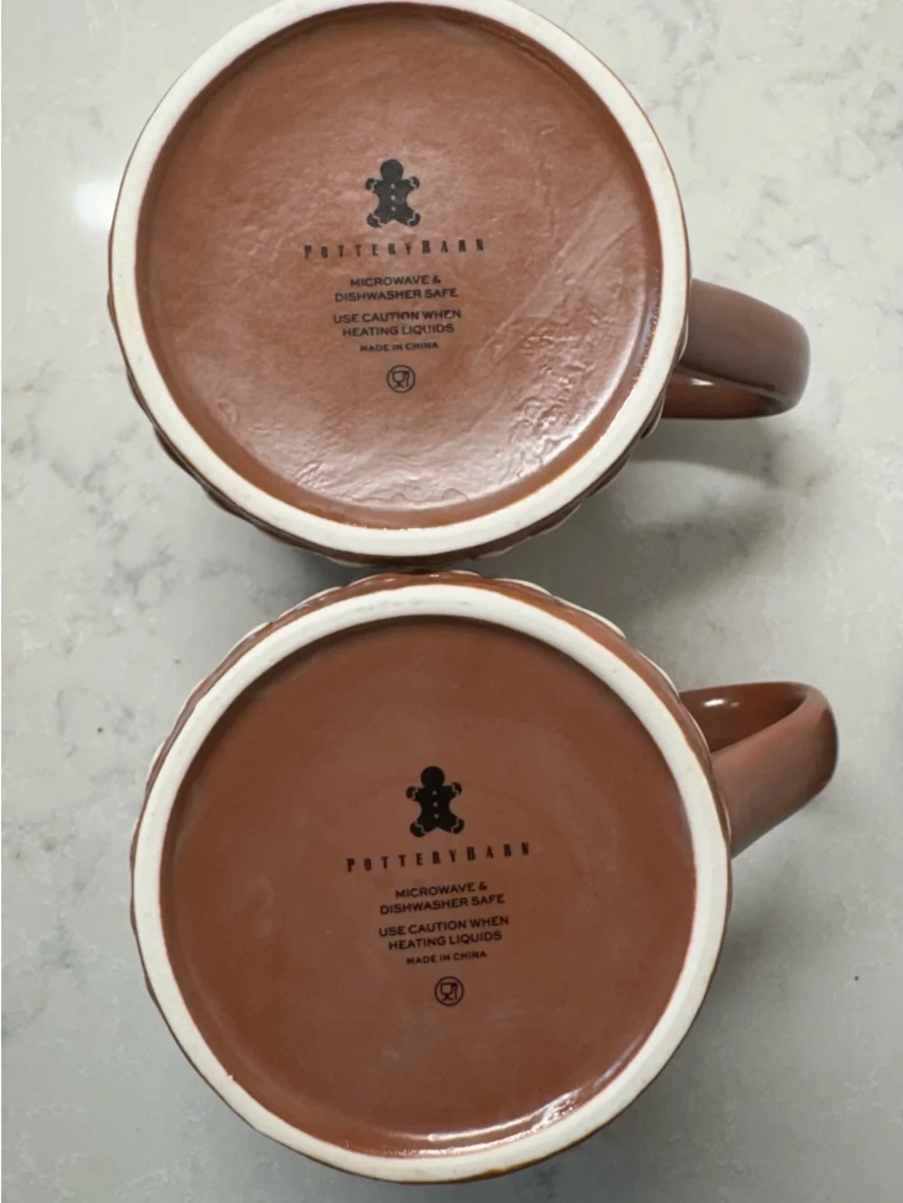 Pottery Barn Brown Ceramic Mug with White Snowflake Design